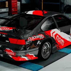 Czarny sportowy samochód z czerwono-białymi grafikami, numerem 71 i napisem "CLOCKWISE RACING EXPERT". Idealny do gry BeamNG Drive za darmo!