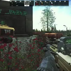 Gracz celuje z karabinu MDR w grze Escape from Tarkov. W tle widać żółty pojazd z napisem "TAT" i zniszczone otoczenie, idealne na nowy tarkov wipe.