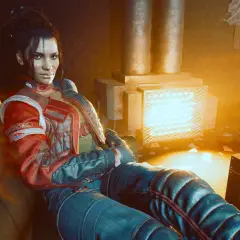 Kobieta w stylu panam cyberpunk siedzi przy rozgrzanym piecyku, otoczona futurystycznym wnętrzem.