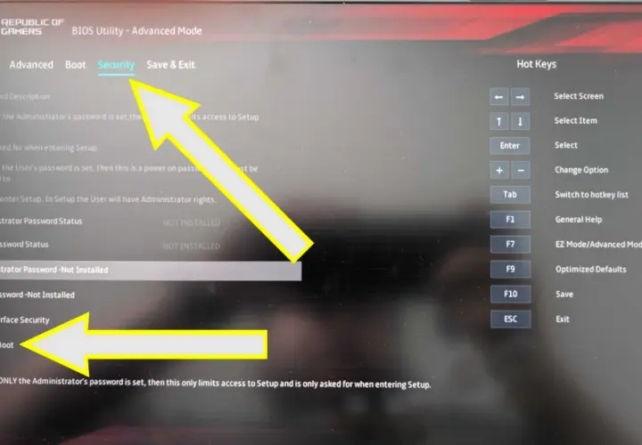 Menu BIOS z opcją "Secure Boot" zaznaczoną strzałką. Ustawienia bezpieczeństwa systemu.