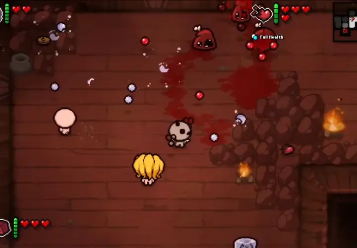 Dwie postacie w grze The Binding of Isaac walczą z potworami. Tryb co-op pozwala na wspólną zabawę.
