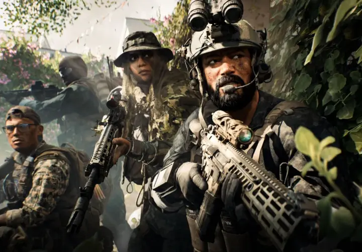 Żołnierze w kamuflażu, gotowi do akcji w kampanii Battlefield 6. W tle kwitnące krzewy i zieleń.