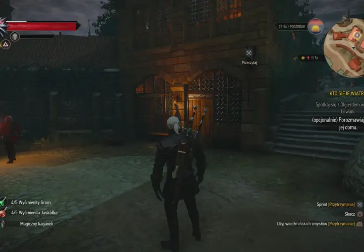 Geralt stoi przed kamienną budowlą, gdzie czeka go serce z kamienia zakończenia misji. W tle widać strażnika z pochodnią.