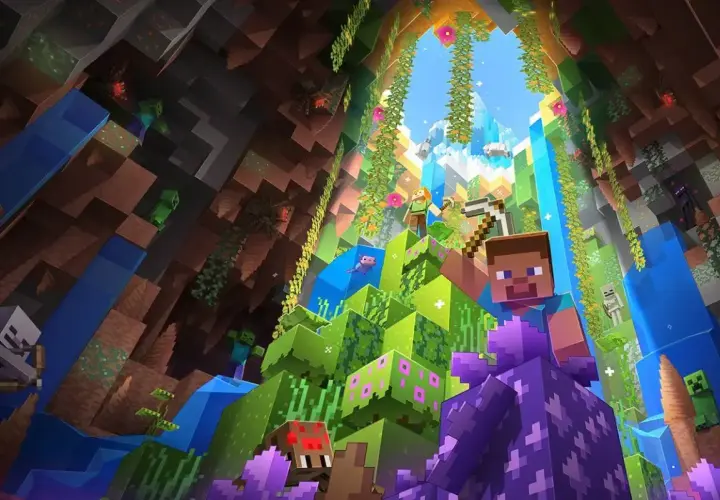 Steve i Alex eksplorują jaskinię w grze sandbox Minecraft. Wokół nich zombie, pająki i enderman.