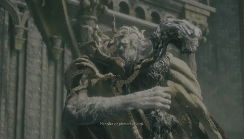 Margit, the Fell Omen z Elden Ring, z groźną miną i kosturem. "Napędza cię płomień ambicji.
