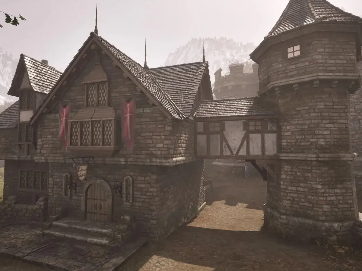 Kamienna budowla z czerwonymi sztandarami, wejście do oblivion gildia wojowników.