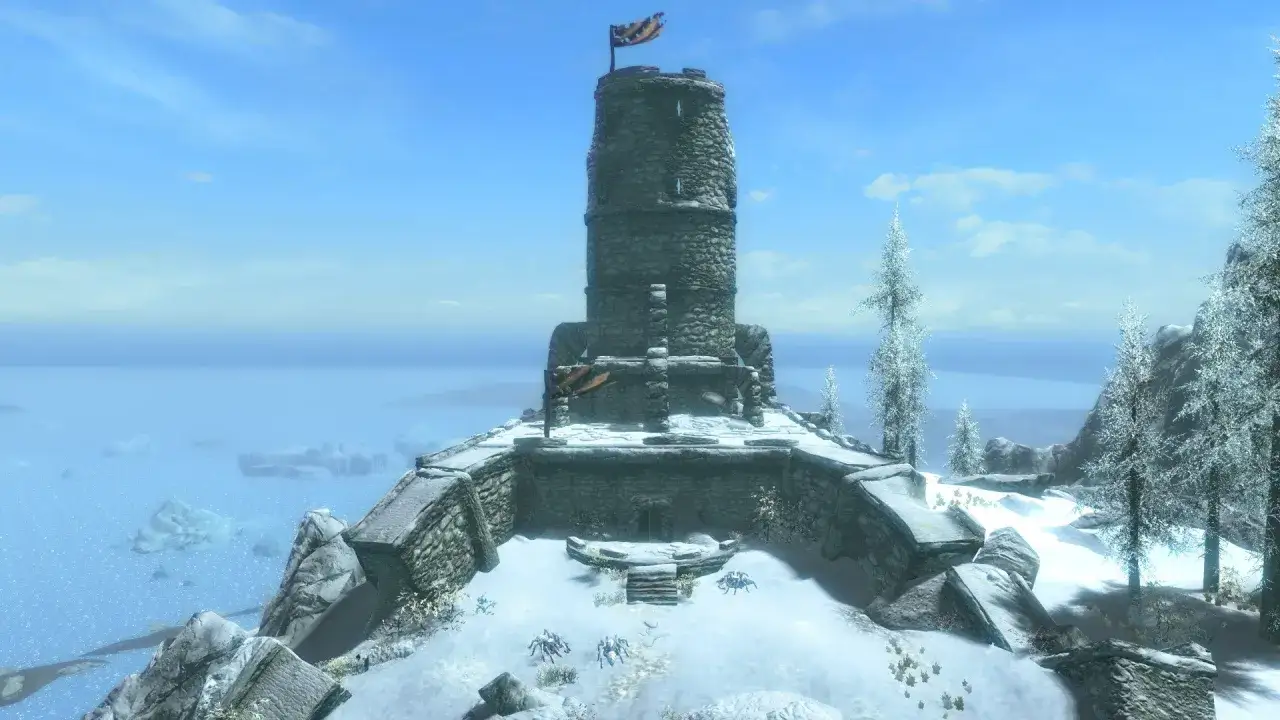 Śnieżna forteca na skale, z flagą na szczycie wieży. To prawdziwy skyrim koszmar na jawie, gdzie czają się pająki.