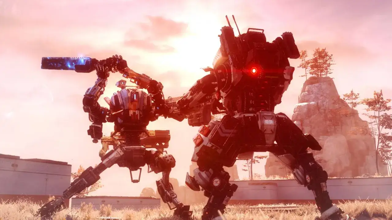 Dwa tytany walczą na tle zachodzącego słońca. Jeden z nich trzyma broń z niebieskim promieniem. Wygląda jak scena z Titanfall 3.