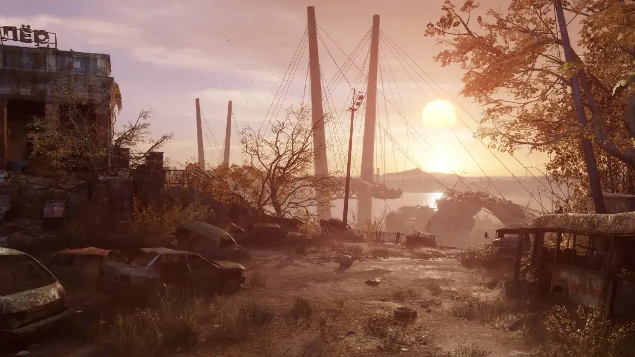 Zniszczone miasto, wraki samochodów i autobusów, most w oddali. Sceneria z gry Metro Exodus Sam's Story.