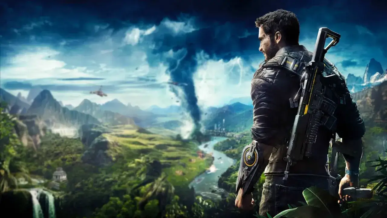 Rico Rodriguez z karabinem na plecach obserwuje niszczycielski wir w tropikalnym krajobrazie, zapowiadając chaos w Just Cause 5.