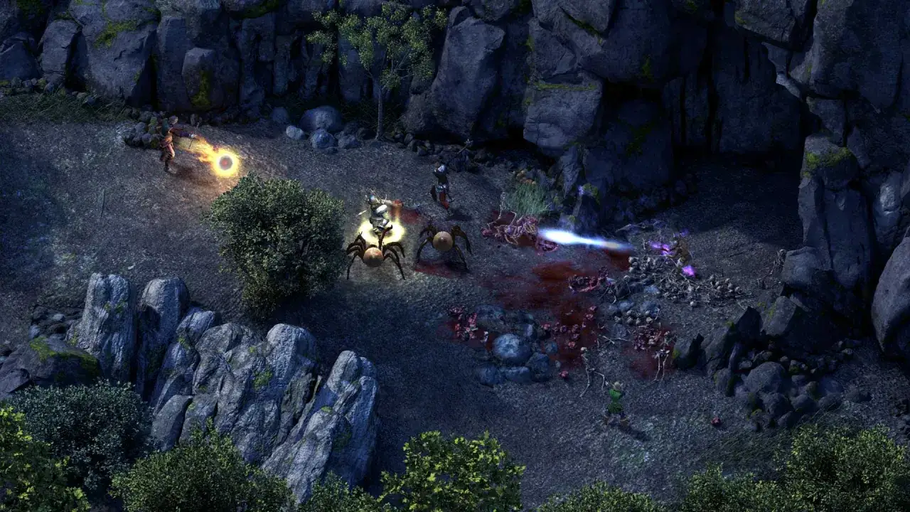 Postapokaliptyczna walka w jaskini, gdzie mag strzela kulą ognia, a wojownik walczy z pająkami. To jedna z najlepszych gier RPG.