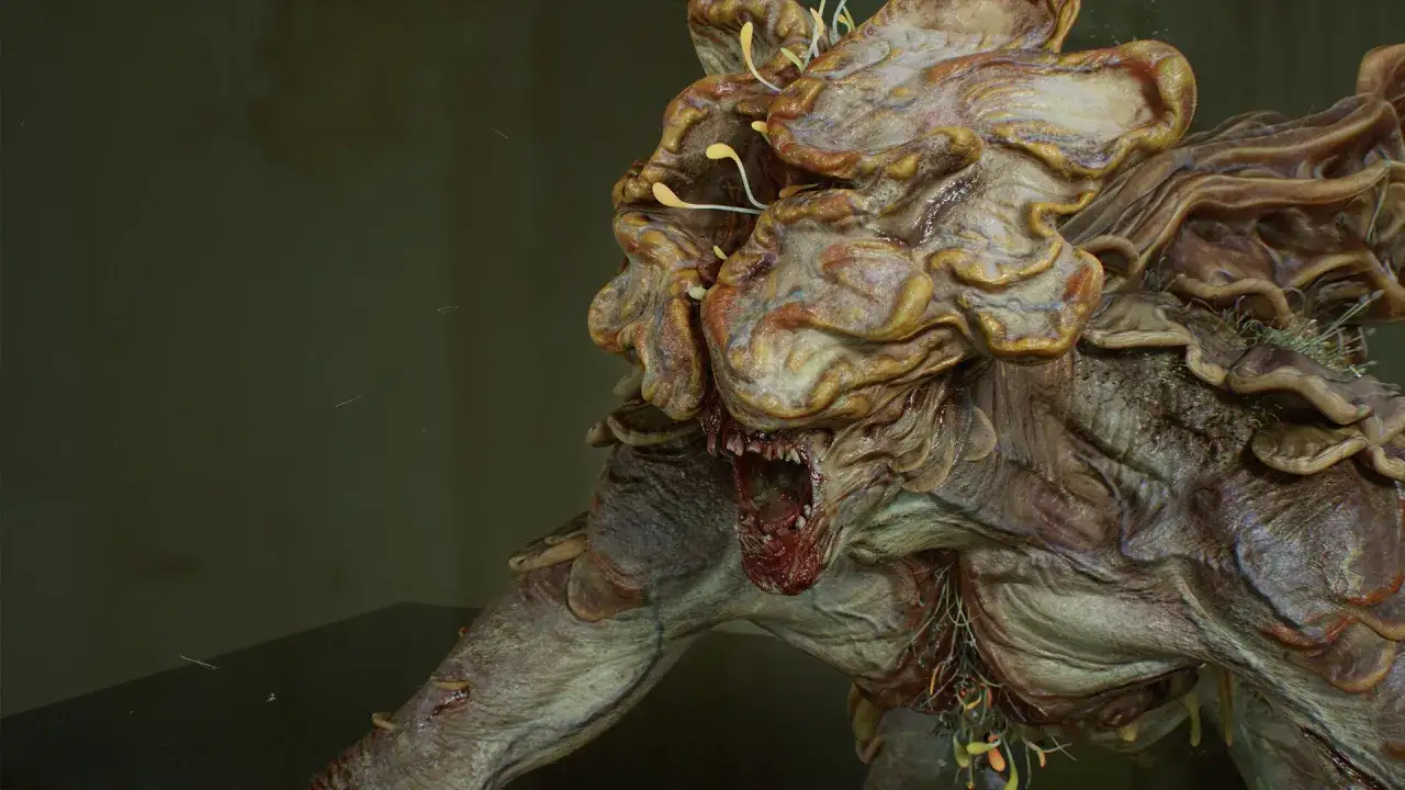 Przerażający klikacz z The Last of Us, z otwartą paszczą pełną zębów i grzybicznymi naroślami.