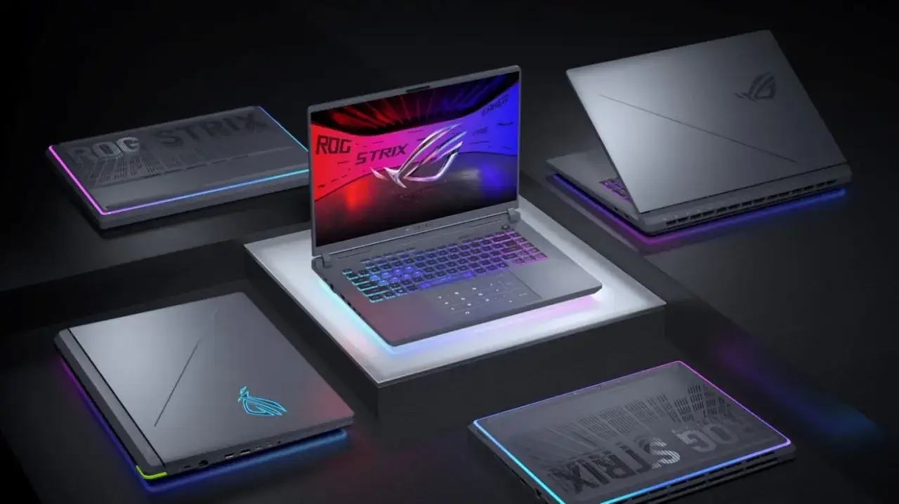 Ranking laptopów gamingowych ROG Strix. Kilka modeli z podświetlanymi klawiaturami i obudowami w neonowych barwach.